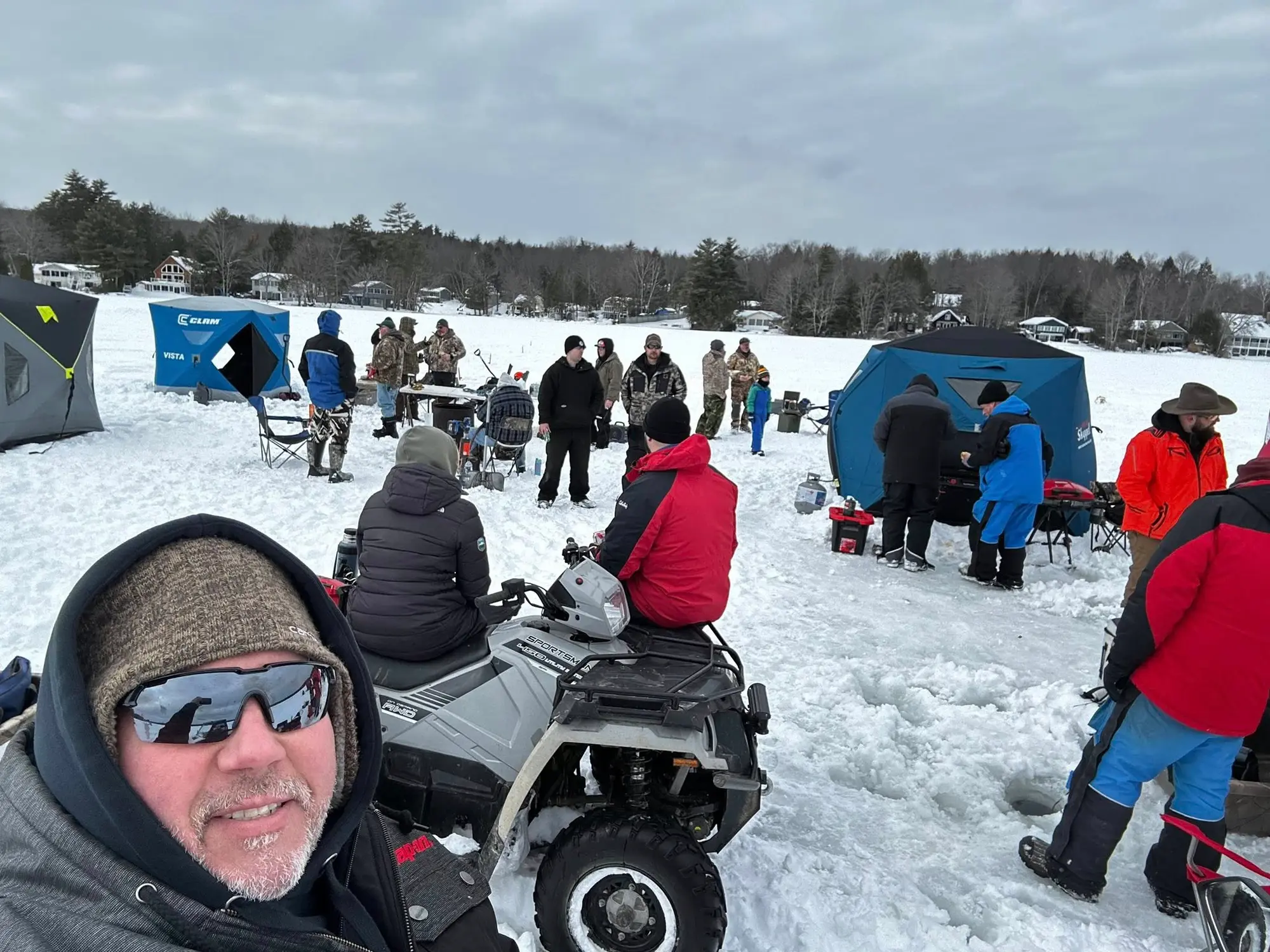 Fishing for Freedom ice fishing event: community gathering on the frozen lake